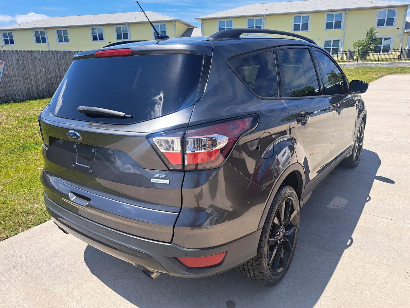 2017 Grey /GRAY Ford Escape (1FMCU0GD8HU) , located at 1181 Aurora Rd, Melbourne, FL, 32935, (321) 241-1100, 28.132914, -80.639175 - Photo#2